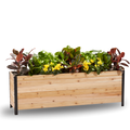A wooden planter box measuring 18 inches wide, 72 inches long, and 24 inches tall, filled with various plants and greenery.